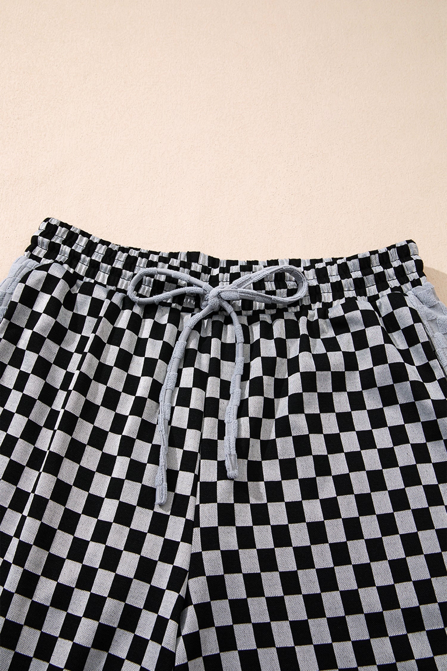 Vega – Pantalón Wide Leg con Estampado Checker