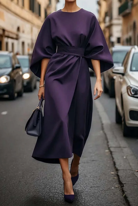 Vestido elegante con mangas farol y cinturón
