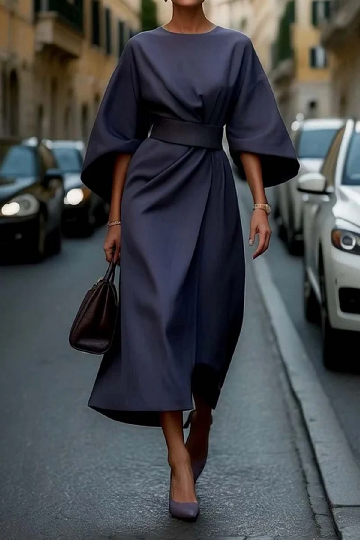 Vestido elegante con mangas farol y cinturón
